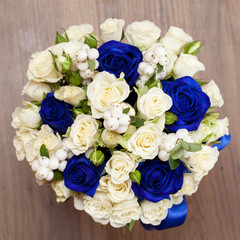 Bouquet of different flowers, roses, carnations, gerberas, sunflowers, irises..