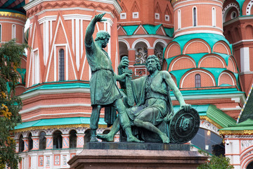 Fototapeta na wymiar The Monument to Kuzma Minin and Prince Dmitry Pozharsky on Red Square near of Saint Basil's Cathedral (sculptor Ivan Martos). The statue was installed in 1818. Moscow, Russia.