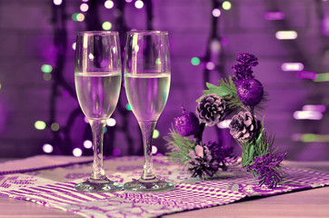 glasses of champagne and Christmas decorations