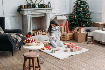 woman with christmas gifts
