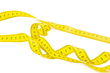 yellow metric measuring tape isolated on white panorama background