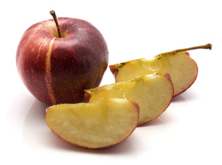 Gala apple, one whole, three slices, isolated on white background
