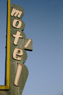 Retro Motel Sign Against a Blue Sky.