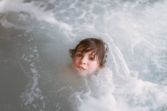 boy submerged in water