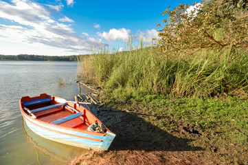 Landscape with a boat by the Bosque Azul Lake in Lagunas de Montebello National Park Chiapas, Mexico