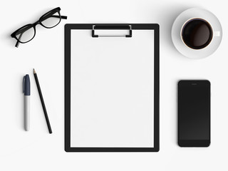 Modern office desk workplace with blank paper, coffee cup, pencil and smartphone copy space on white desk background. Top view. Flat lay style.