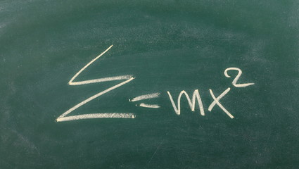Fototapeta premium Physics, mathematical formula on chalkboard, blackboard texture
