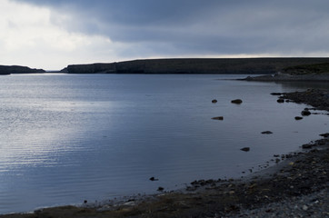 Arctic, gloomy and cold Barents sea is washed by the polar island of Vaigach