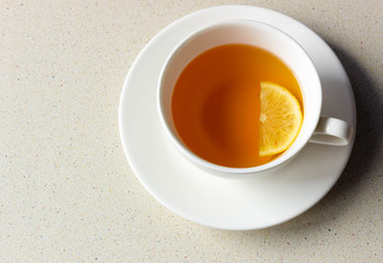 White Cup of Tea with lemon. Top View with Copy Space. Healthy Concept