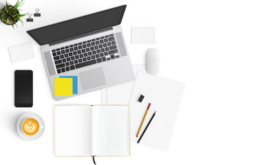 Modern workspace with coffee cup, smartphone, paper, notebook, tablet and laptop copy space on white color background. Top view. Flat lay style.