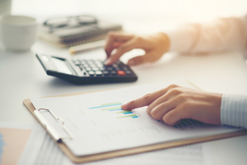 Close up accountant or banker making calculations. Savings,Concept finances and economy