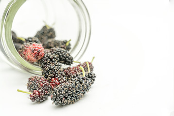 Mulberry berry in clear glass bottle macro photography,Food for heathly concept.