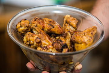 The chef in the kitchen prepares  food with.