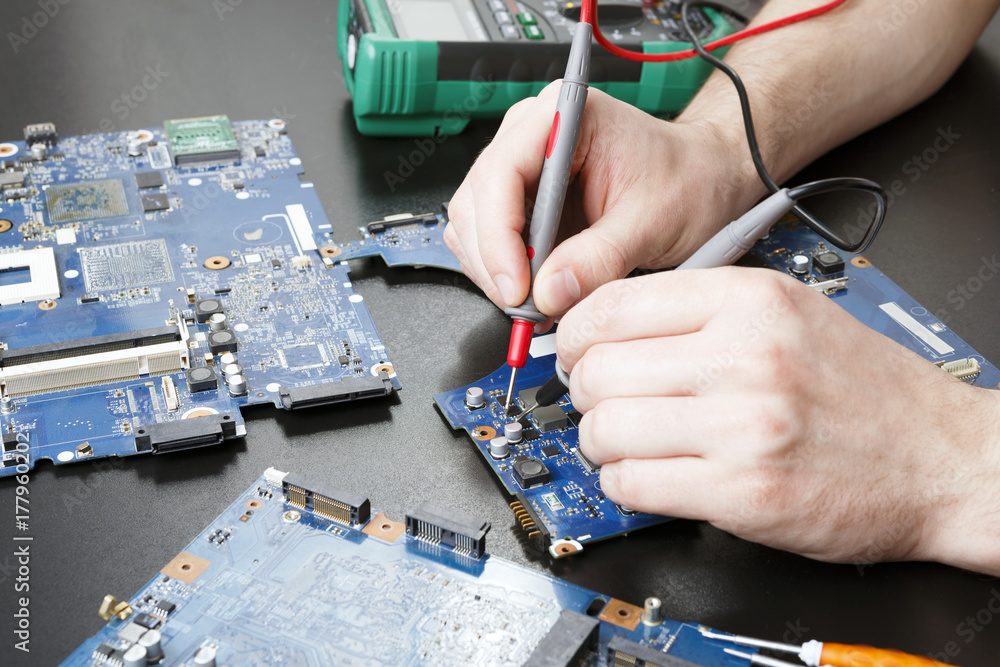 Poster laptop motherboard testing in service center