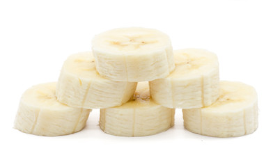 Pyramid of sliced banana circles isolated on white background