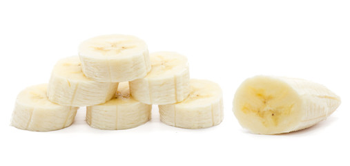 Pyramid of sliced banana circles isolated on white background