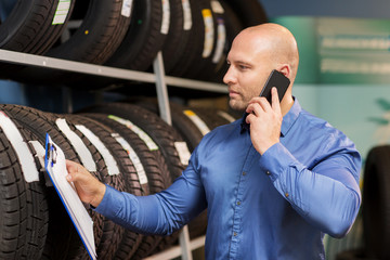 auto business owner ordering tires at car service