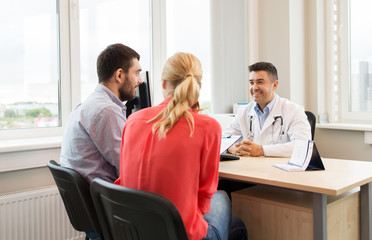 couple visiting doctor at family planning clinic