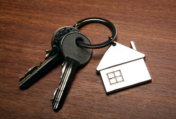 keys from the apartment with a keychain in the form of a house