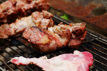 medium roasted  steak  pork on iron grill.Thailand local tradition grill pork
