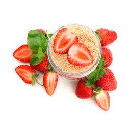 Tasty strawberry dessert in jar, isolated on white