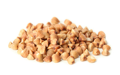 Raw buckwheat on white background