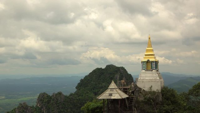 Timelaps of the Stupa at Wat Chalermprakiat Prajomklao Rachanusorn chedis on the mountain top, Lampang province, Thailand