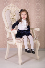 Pretty girl with brunnete hair and pout lips stylish dressed in old style shirt dress skirt posing...