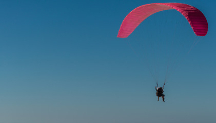 Paragliding in tandem high in the sky
