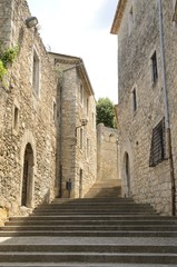 Fototapeta na wymiar Stairs in cobblestone alley in Girona, Spain