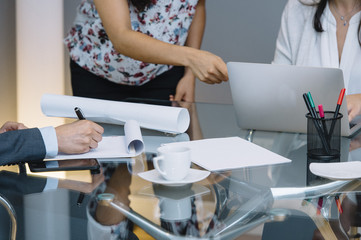 Fototapeta premium business documents on office table with smart phone and laptop