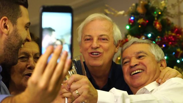 Family taking a selfie in a Christmas Day
