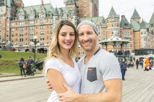 Couple in front of Chateau Frontenac at Quebec city Canada