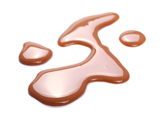 Spilled chocolate milk puddle isolated on white background