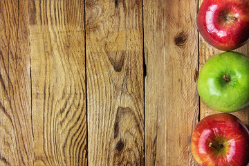 Ripe Colorful Red Green Apples Arranged in Border Frame on Weathered Wood Background. Thanksgiving Harvest Fall Autumn. Copy Space Template