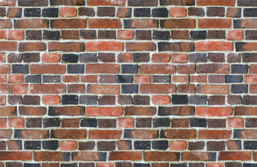 Fototapeta premium part of old brick wall consisting of bricks of different shades