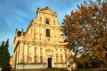 Fototapeta na wymiar The facade of the Baroque Catholic Church in Poznan in Poland.