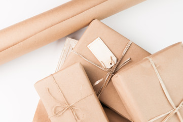 packages wrapped in brown paper and tied with twine
