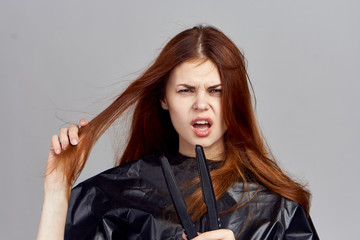 the red hairdresser in black did not work with hair folks and she is somewhat unhappy with this fact