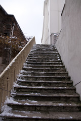 Old icy stairs in winter