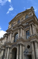 Fototapeta na wymiar Majestic architecture of the North Side of Louvre Museum (Richelieu Pavilion), famous landmark from Paris (1st arrondissement), France