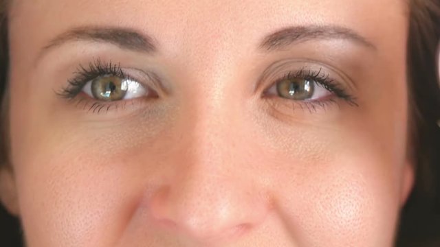 A beautiful girl with a future currency of crypto, closing her eyes bitcoins with coins.