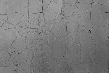 Wall fragment with scratches and cracks