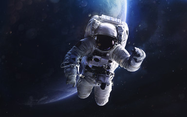 Fototapeta na wymiar Astronaut. Deep space image, science fiction fantasy in high resolution ideal for wallpaper and print. Elements of this image furnished by NASA
