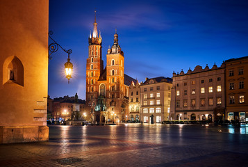 Fototapeta na wymiar Saint Mary's Basilica famous landmark on market square in Krakow