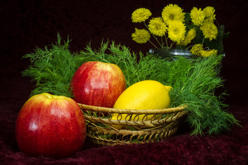 Healthy food - apples Lemon greenery in a basket
