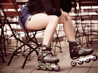 Woman riding roller skates