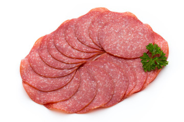 Salami slices isolated on white background.