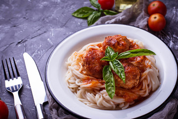Spaghetti pasta with meatballs and tomato sauce. 