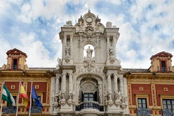 Fototapeta na wymiar Portada de estilo barroco del Palacio de San Telmo, sede de la Presidencia de la Junta de Andalucia en Sevilla, España